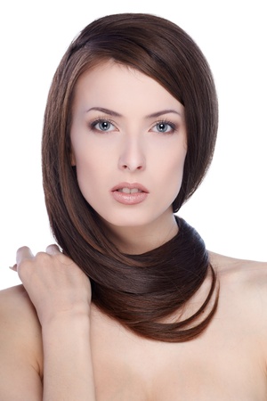 Portrait of beautiful female model on white backgroundの写真素材