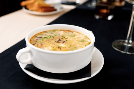 Spicy Thai soup with seafood and vegetablesの写真素材