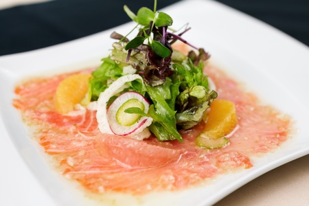 Trout carpaccio with citrus saladの写真素材