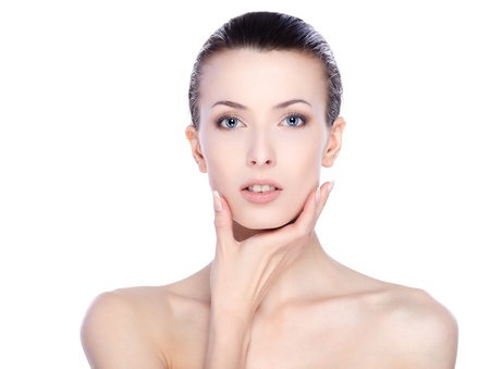 Portrait of beautiful female model on white backgroundの写真素材