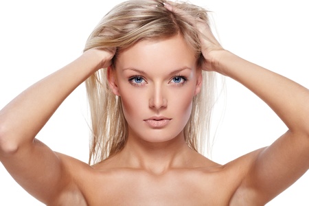 Portrait of beautiful female model on white backgroundの写真素材