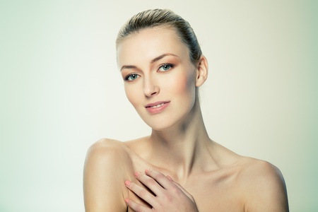 Portrait of beautiful female model on white backgroundの写真素材