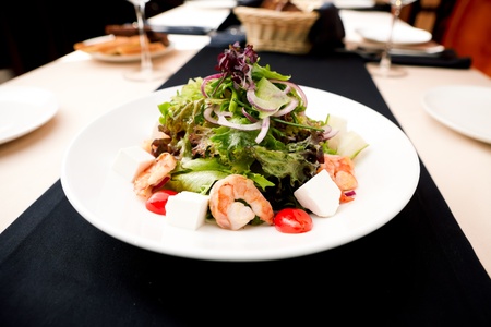 Greek salad with feta cheese and smoked shrimpの写真素材