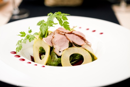 Green salad with cold veal, pear and beetの写真素材