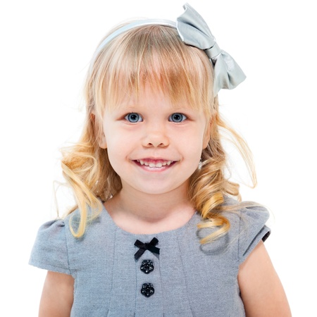 Little blond girl smiling isolated on white backgroundの写真素材