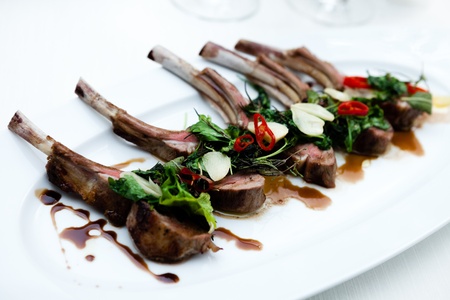 Grilled lamb chops with herbsの写真素材