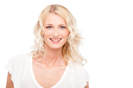 Young cute smiling girl isolated on whiteの写真素材