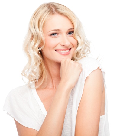 Young cute smiling girl isolated on whiteの写真素材