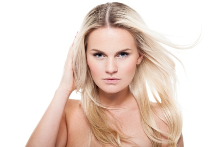 Portrait of a sensual young blond woman isolated on white backgroundの写真素材