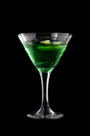 Apple-melon martini coctail isolated on black backgroundの写真素材