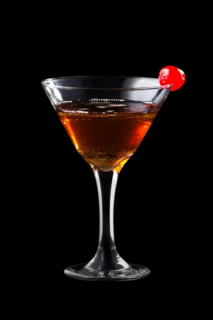 Apple manhattan coctail isolated on black backgroundの写真素材