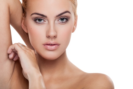Portrait of beautiful female model on white backgroundの写真素材