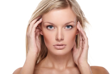 Portrait of beautiful female model on white backgroundの写真素材