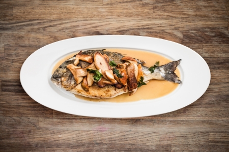 Sea bream with porcini mushroomsの写真素材