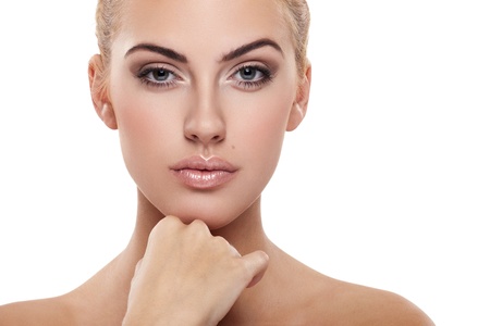 Portrait of beautiful female model on white backgroundの写真素材