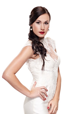 Beautiful brunette bride in white dress isolatedの写真素材