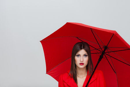 woman with red umbrellaの写真素材