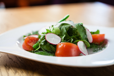 fresh salad on a plateの写真素材