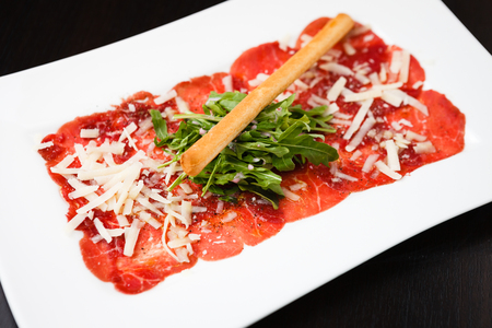 Meat carpaccio with Parmesanの写真素材