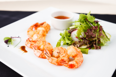 Tempura shrimps with saladの写真素材