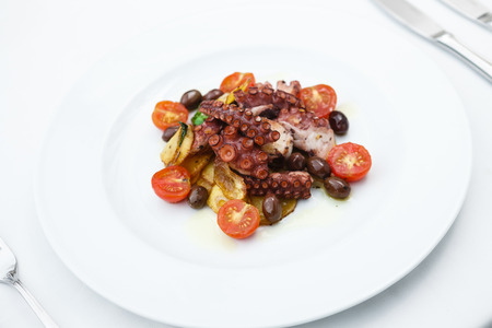 Grilled octopus with vegetablesの写真素材
