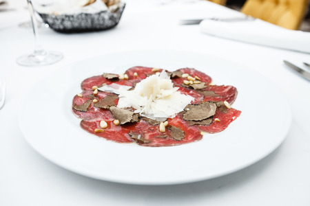 Beef carpaccio served on a plateの写真素材