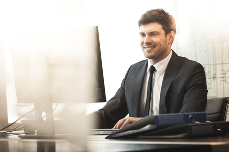 Young businessman in officeの写真素材