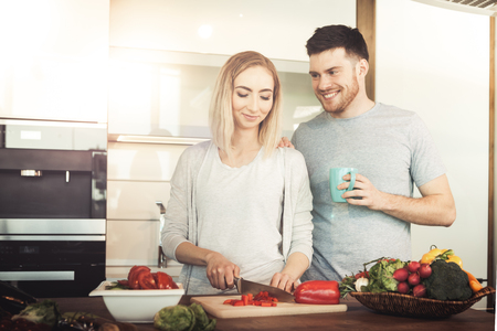 couple preparing foodの写真素材