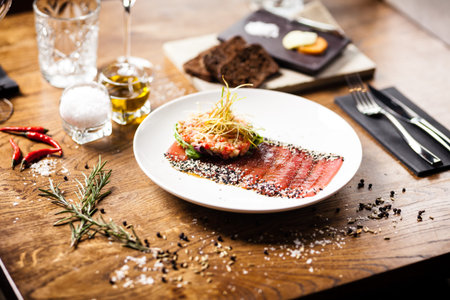 Tuna sashimi served on a plate in restaurant