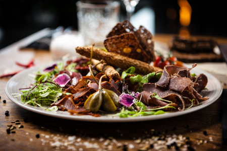 Meat platter for two served on a plate in restaurantの写真素材