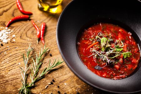 Beetroot soup Borscht with meat and sourcream served in restaurantの写真素材