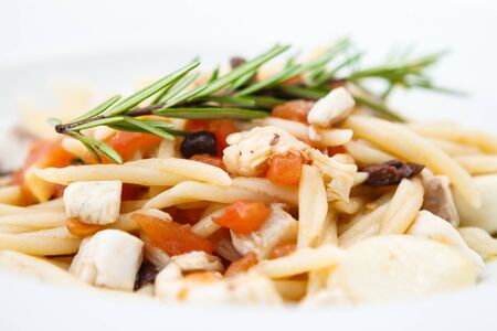 Pasta with sea bream served on a plateの写真素材