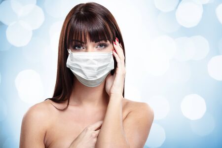 corona virus concept. woman in protective maskの写真素材
