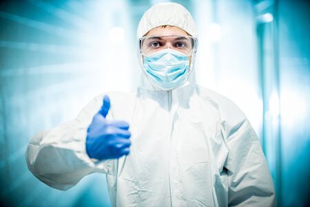 corona virus concept. male doctor showing thumb upの写真素材