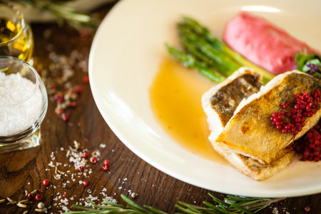 Pike-perch fillet. Asparagus, pearl couscous, white wine sauce, beet-flavored mashed potatoes....
