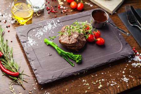 Estonian beef tenderloin steak. Delicious healthy traditional food closeup served for lunch in modern gourmet cuisine restaurant.の写真素材