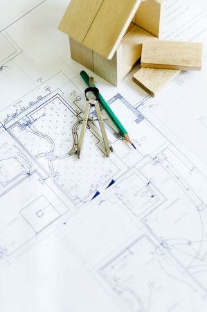 blueprint , wooden model of house and drawing toolsの写真素材