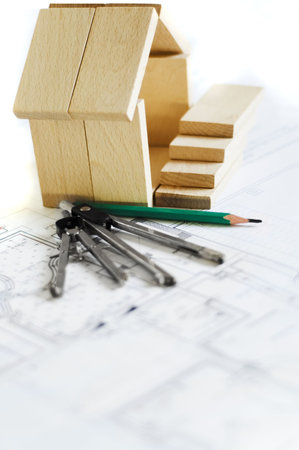 blueprint , wooden model of house and drawing toolsの写真素材