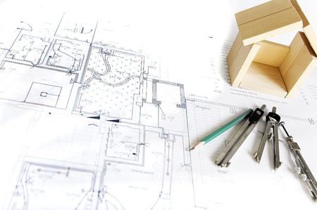 blueprint , wooden model of house and drawing toolsの写真素材