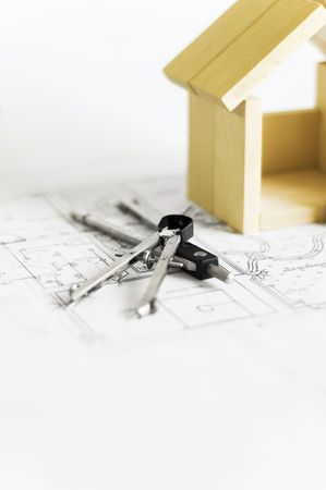 blueprint, wooden model of house and drawing toolsの写真素材