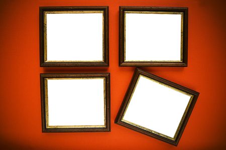 empty picture frames on red wall の写真素材
