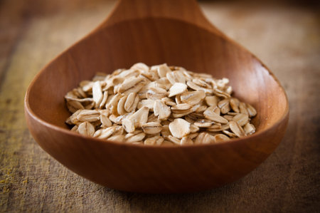 Cereal in a wooden spoon