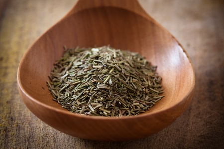 Rosemary on wooden spoonの写真素材