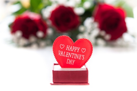 red roses with a Valentine`s heartの写真素材