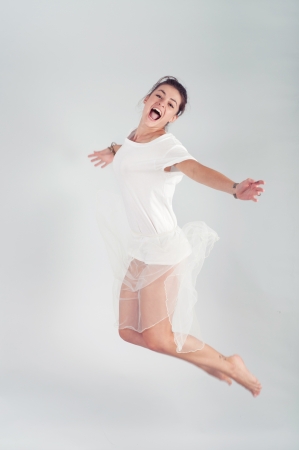 young woman jumpingの写真素材