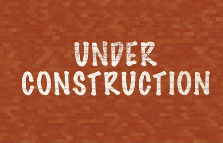 Under contruction text on wallの写真素材