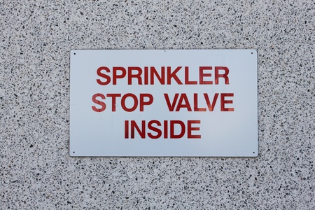 warning sign board on the wallの写真素材