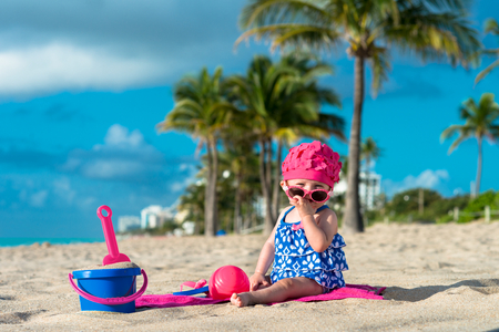 Baby Playing on Beachの写真素材