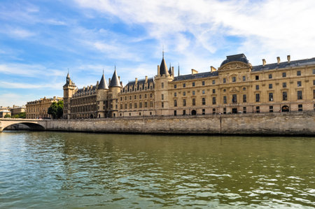 View across the Seine River Paris France with The Conciergerie and Palace of Justiceのeditorial素材