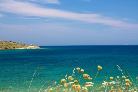 sea view from izmir with lighthouse under blue skyの写真素材